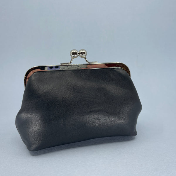 One side of the black leather purse