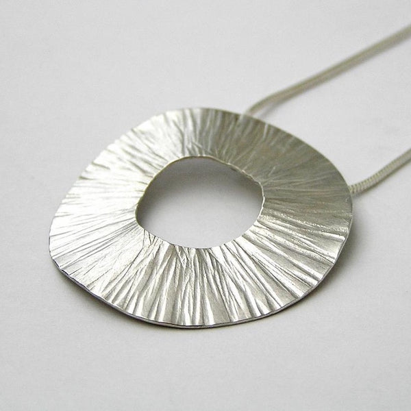 Radiant silver pendant by Anna K Baldwin