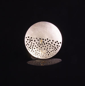 Round textured silver brooch with 2 diamonds and 18ct gold